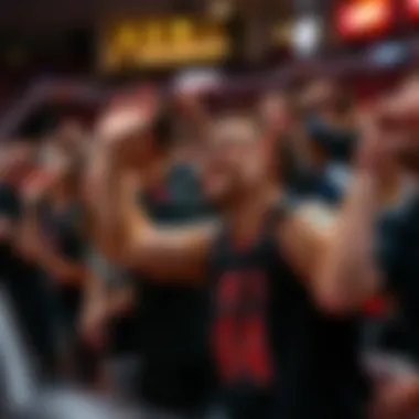 Fans cheering passionately during a basketball match.