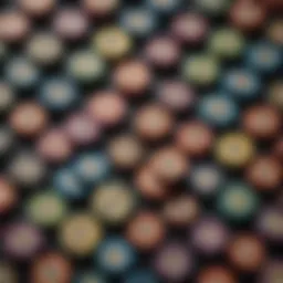 A stylish assortment of poker chips featuring various colors and designs on a felt surface